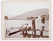 Gustav Klimt (in smock) and Emilie Flöge (standing behind him) with friends and family on a dock near the Litzlberg Keller, Litzlberg/Attersee